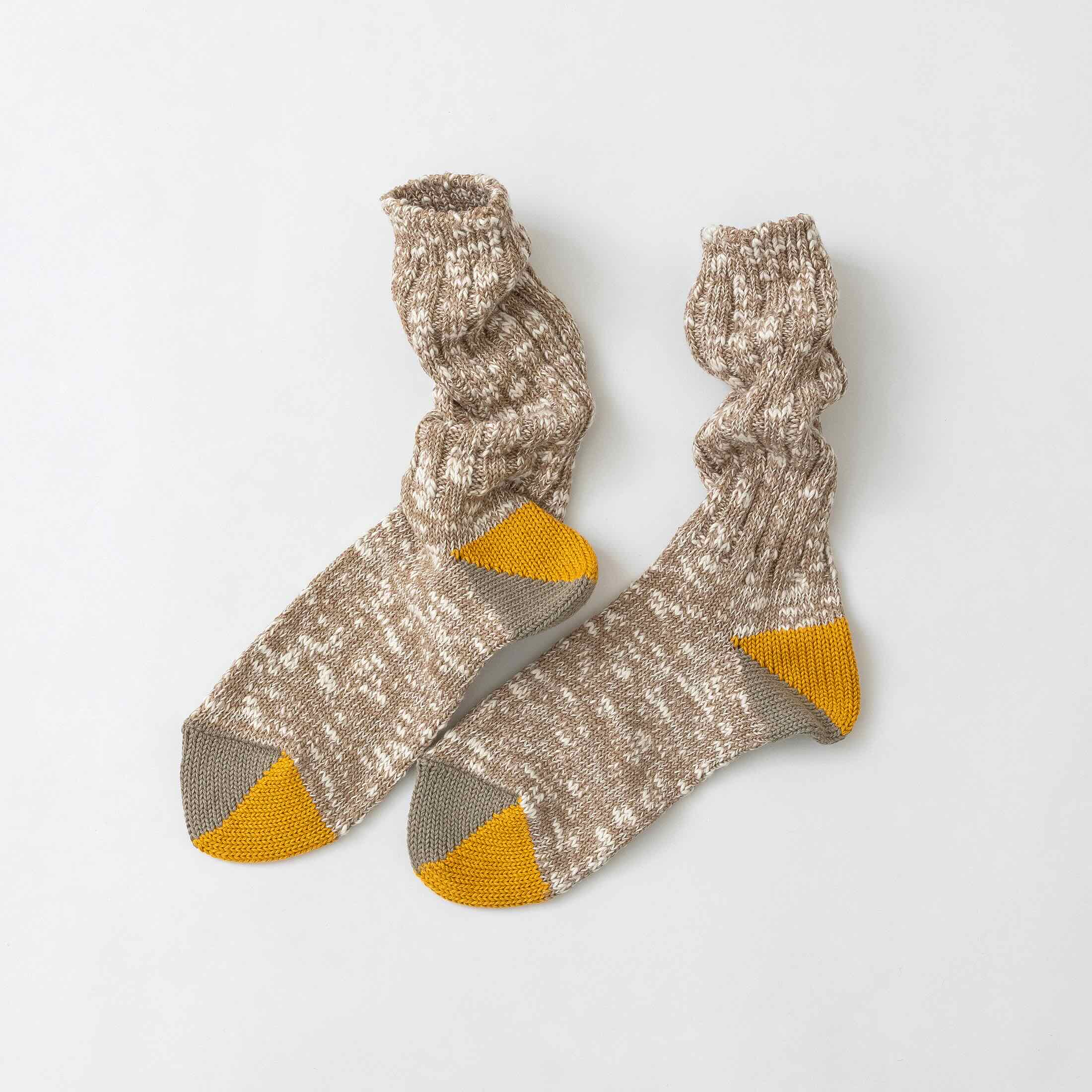 Pair of knitted socks with beige accents
